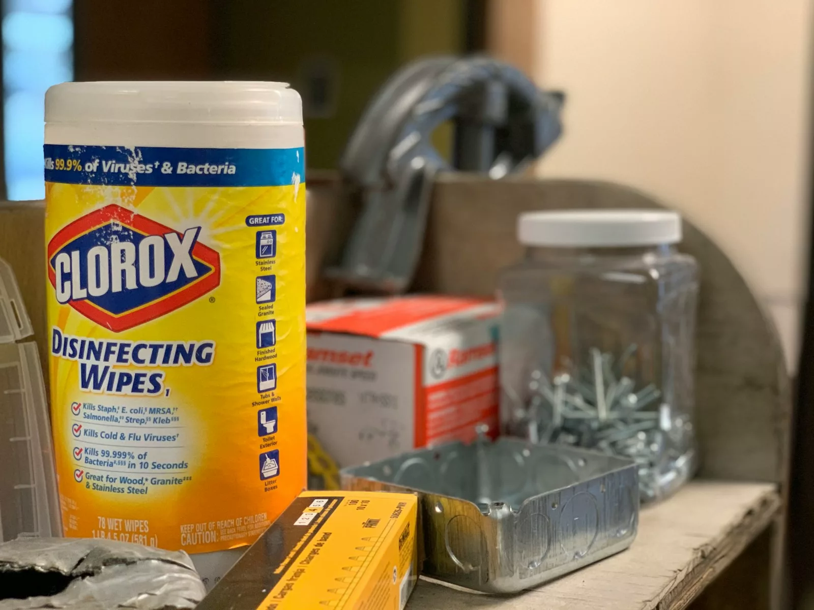 clorox disinfecting wipes on brown wooden table